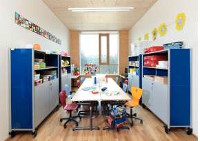 Work rooms equipped with ergonomic furniture.